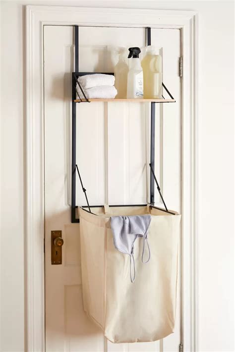 over the door hamper|behind the door laundry hamper.